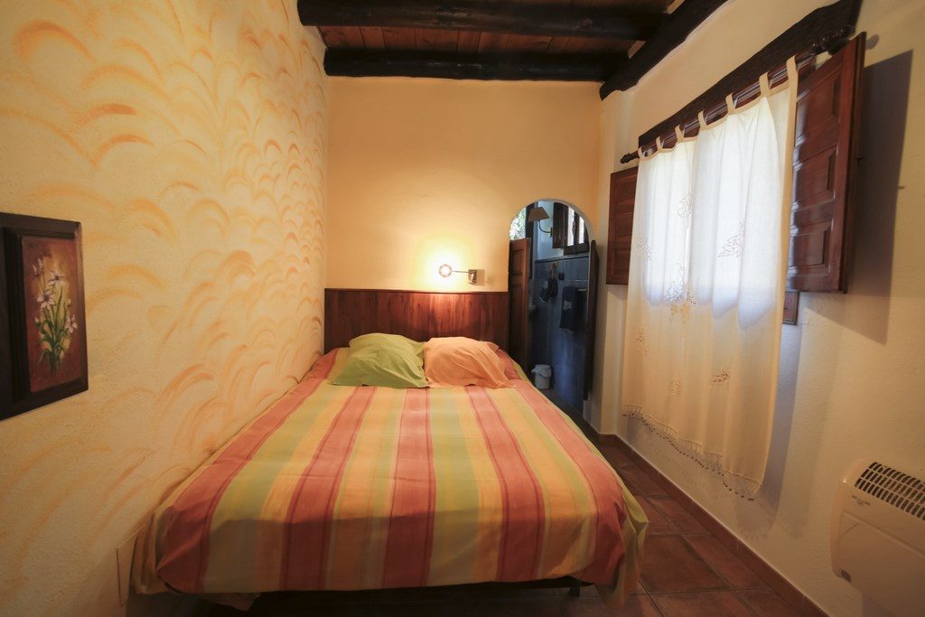 El Brazal. Dormitorio Suite Nogal